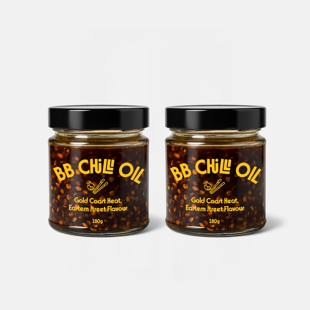 Two jars of BB Chilli Oil on a white background