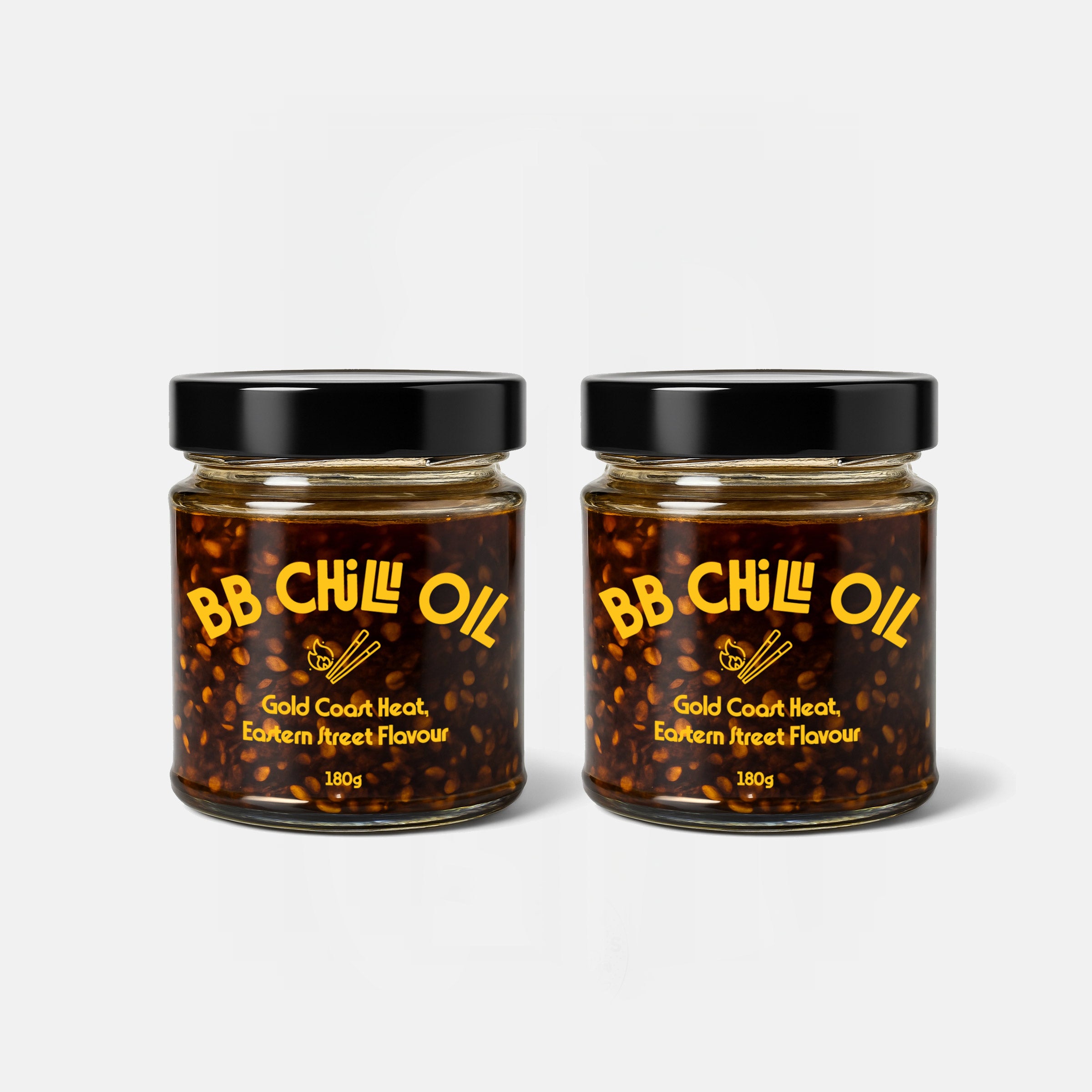 Two jars of BB Chilli Oil on a white background